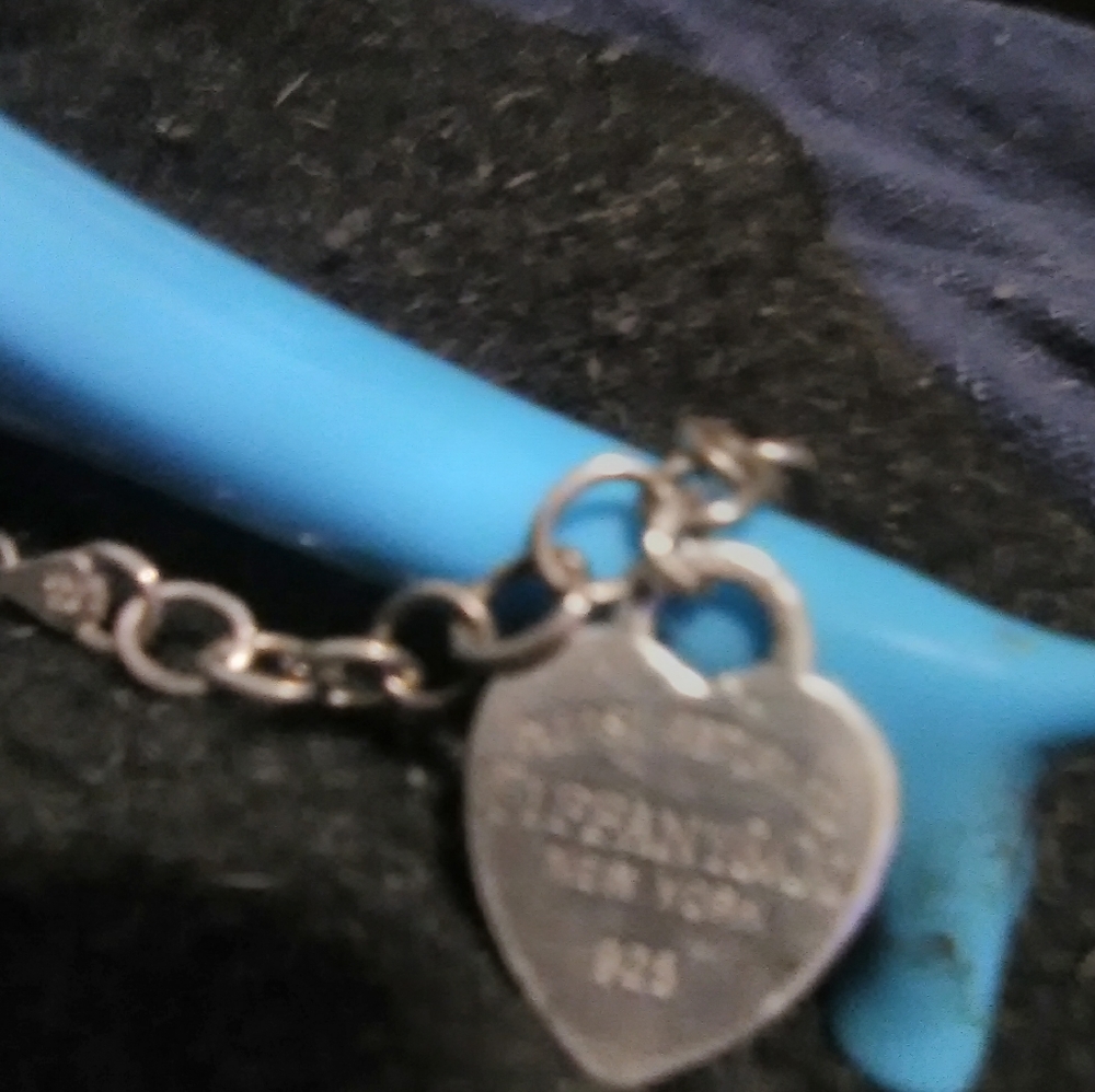 Tiffany's 925 Sterling charm bracelet with heart